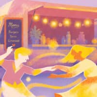 Un couple danse devant un food truck.