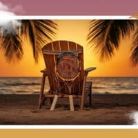 Une raquette de tennis, posée contre un transat au bord d'une plage.